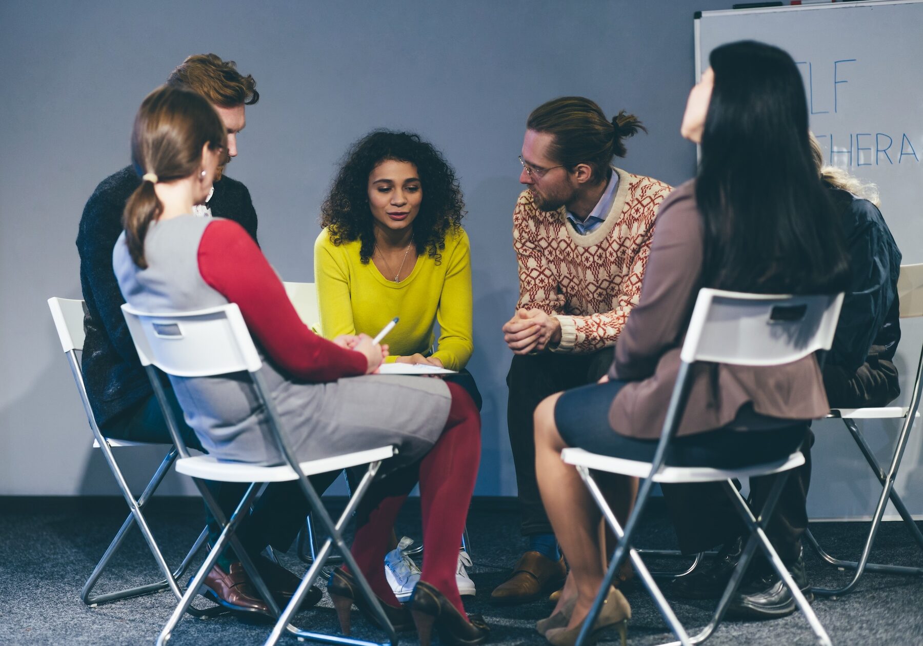 People with different problems having group meeting. Exchanging advice. Toned concept.